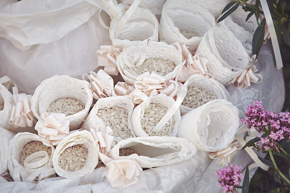 A short, lace, Rembo Styling wedding dress and shades of navy blue for a garden blessing in Tuscany. Photography by Jules Bower.