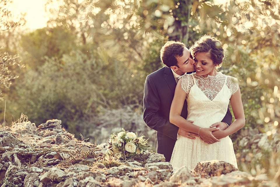 A short, lace, Rembo Styling wedding dress and shades of navy blue for a garden blessing in Tuscany. Photography by Jules Bower.