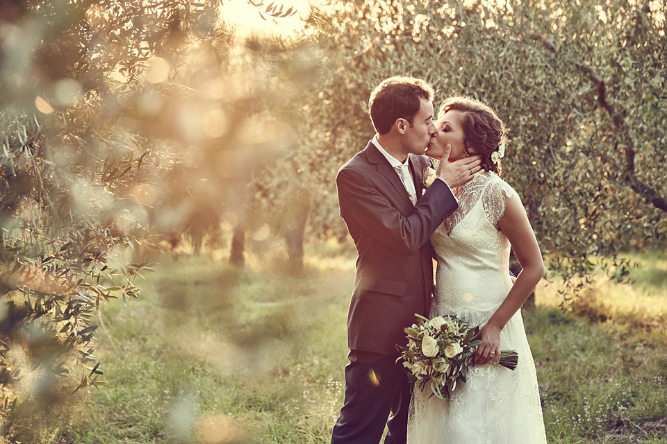 A short, lace, Rembo Styling wedding dress and shades of navy blue for a garden blessing in Tuscany. Photography by Jules Bower.