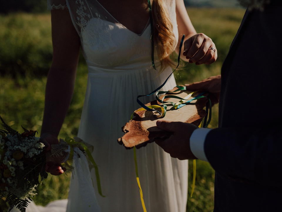 A Swiss mountain elopement. The bride wears a Stephanie Wolff gown. Photography by Capyture.