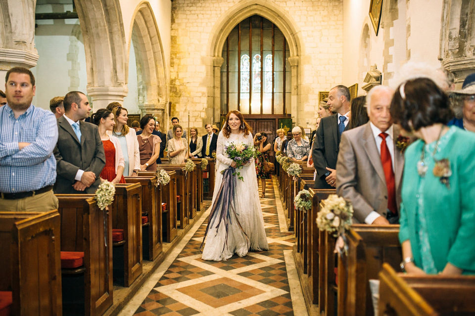 The bride wears an Edwardian inspired wedding dress for her homespun pub wedding. Images by Green Antlers Photography.