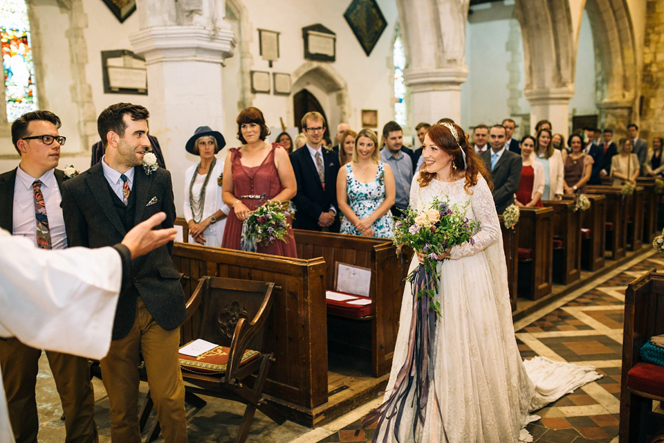 The bride wears an Edwardian inspired wedding dress for her homespun pub wedding. Images by Green Antlers Photography.