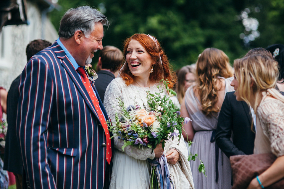 The bride wears an Edwardian inspired wedding dress for her homespun pub wedding. Images by Green Antlers Photography.