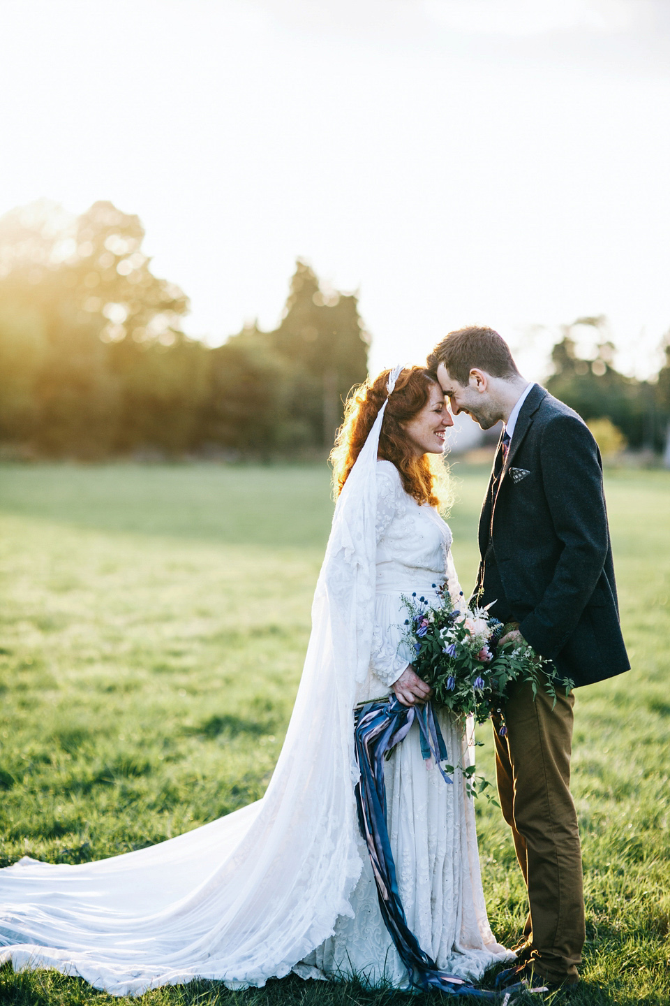 The bride wears an Edwardian inspired wedding dress for her homespun pub wedding. Images by Green Antlers Photography.