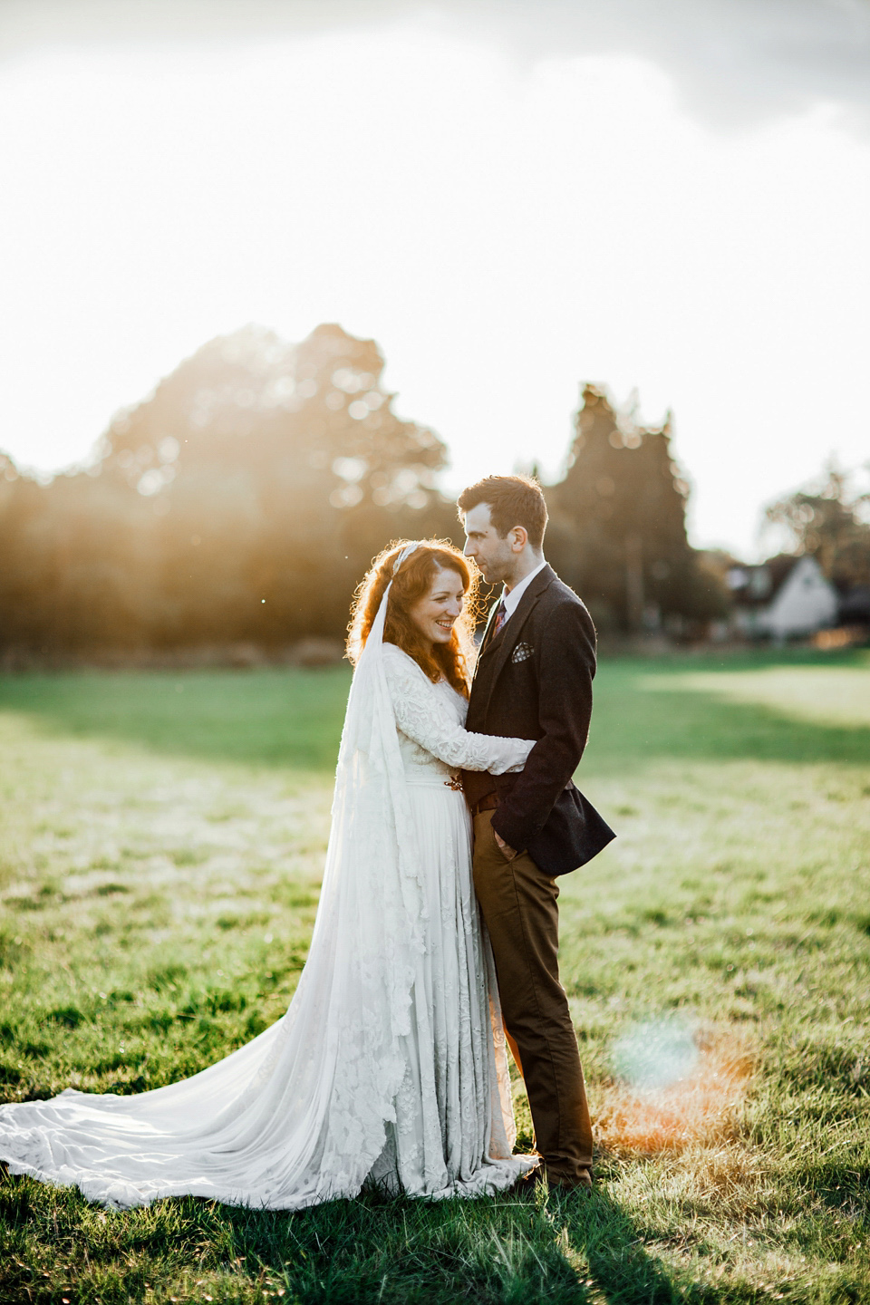 The bride wears an Edwardian inspired wedding dress for her homespun pub wedding. Images by Green Antlers Photography.
