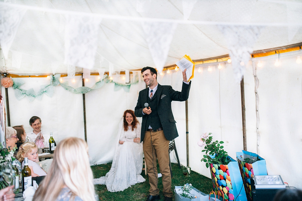 The bride wears an Edwardian inspired wedding dress for her homespun pub wedding. Images by Green Antlers Photography.