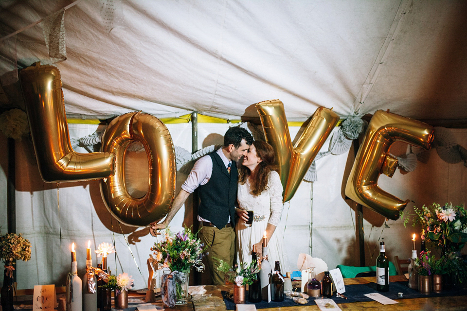 The bride wears an Edwardian inspired wedding dress for her homespun pub wedding. Images by Green Antlers Photography.