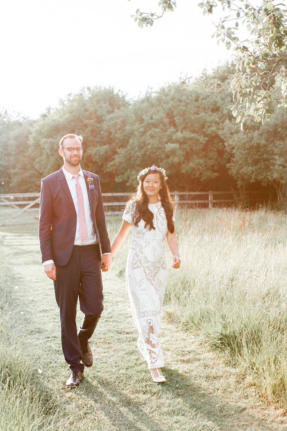 Jenny wore a 'Lost in Paris' gown, created from vintage French lace, for her spiritual and homespun wedding held at Court Farm in Somerset. Photography by Kerry Bartlett