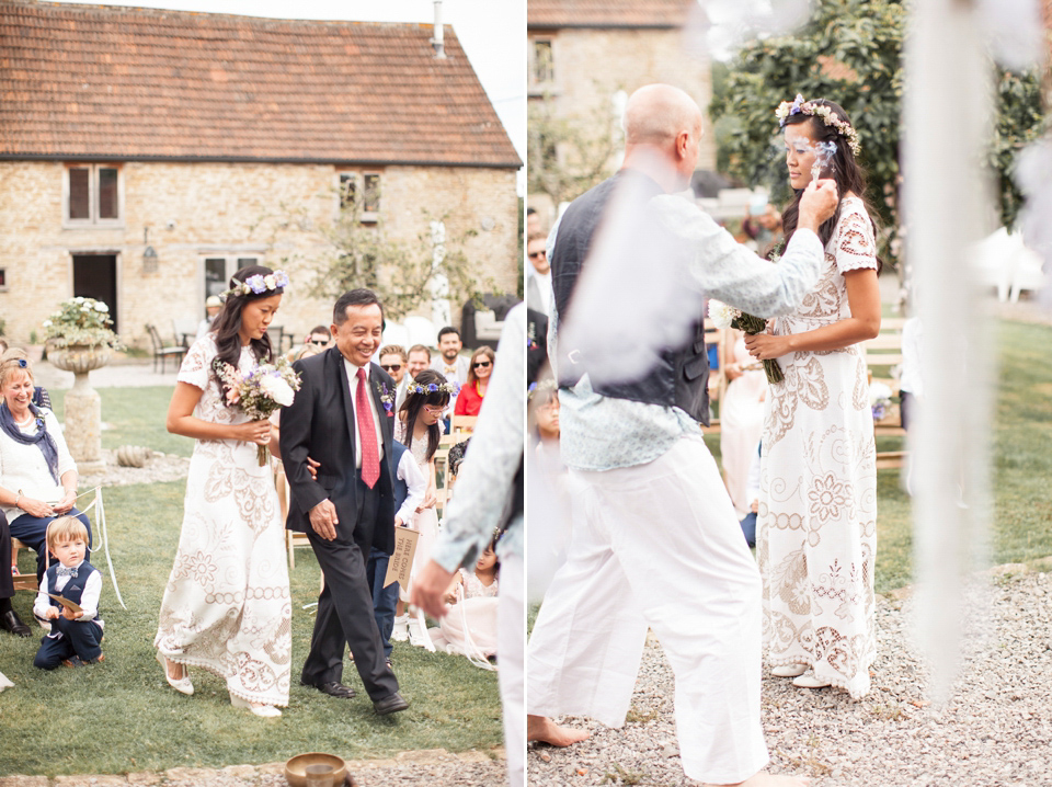 Jenny wore a 'Lost in Paris' gown, created from vintage French lace, for her spiritual and homespun wedding held at Court Farm in Somerset. Photography by Kerry Bartlett