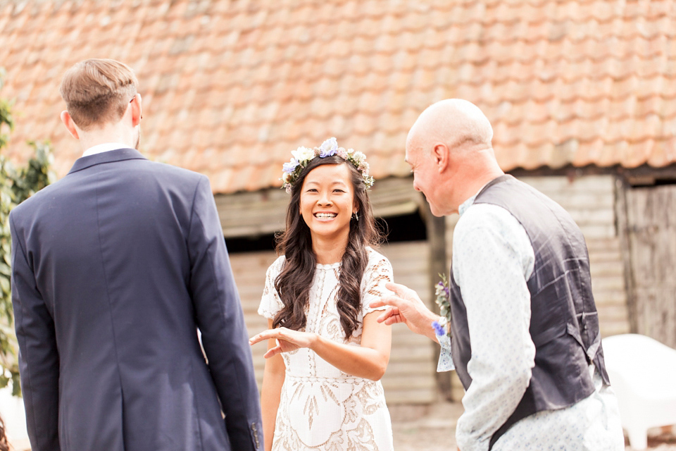 Jenny wore a 'Lost in Paris' gown, created from vintage French lace, for her spiritual and homespun wedding held at Court Farm in Somerset. Photography by Kerry Bartlett