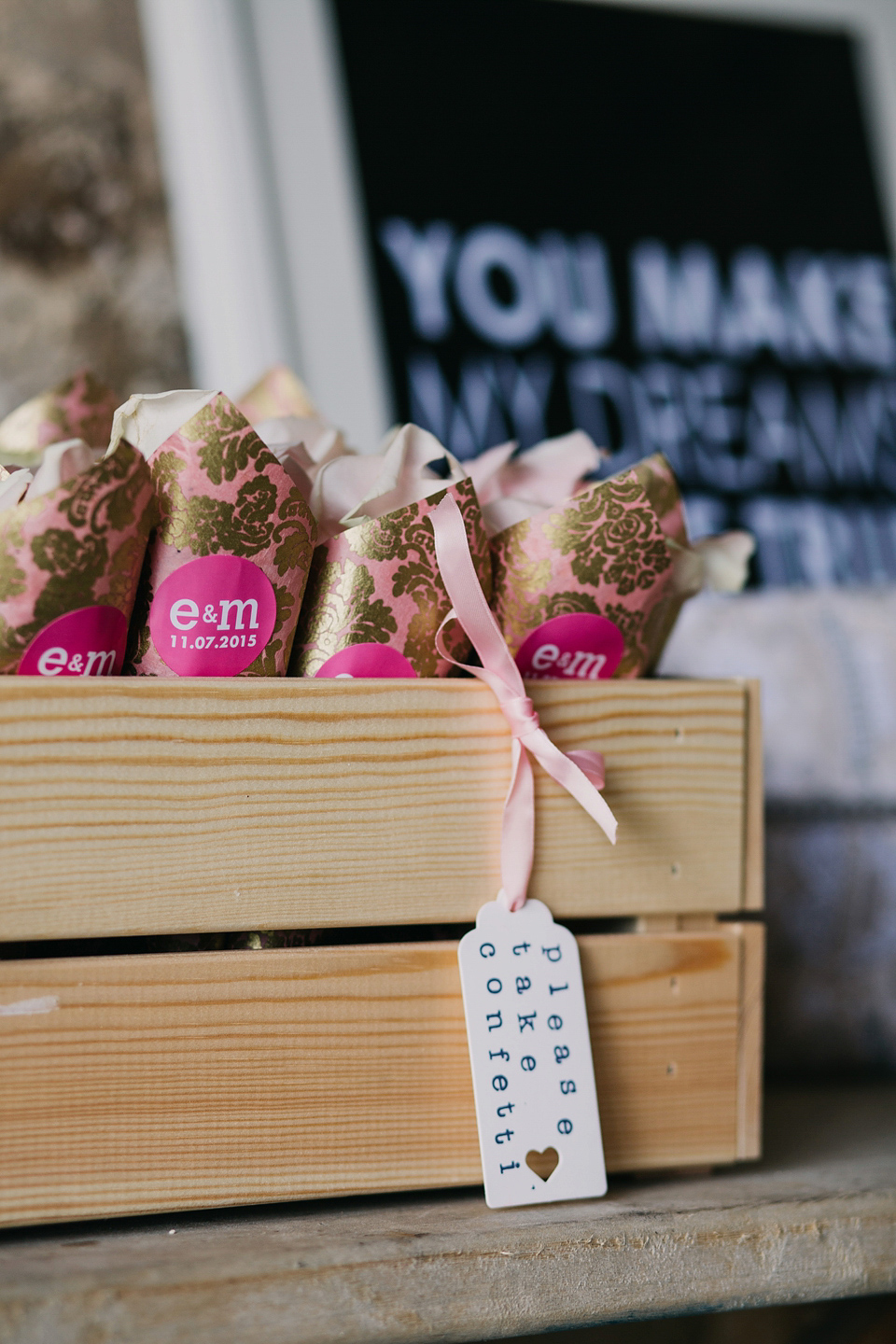 A Suzanne Neville gown and shades fo pink for a colourful wedding at Healey Barn, Northumberland. Photography by John Hope.