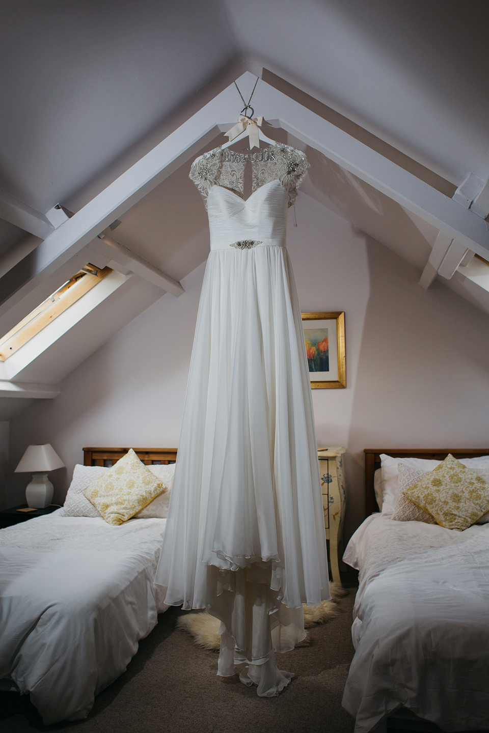 A Suzanne Neville gown and shades fo pink for a colourful wedding at Healey Barn, Northumberland. Photography by John Hope.