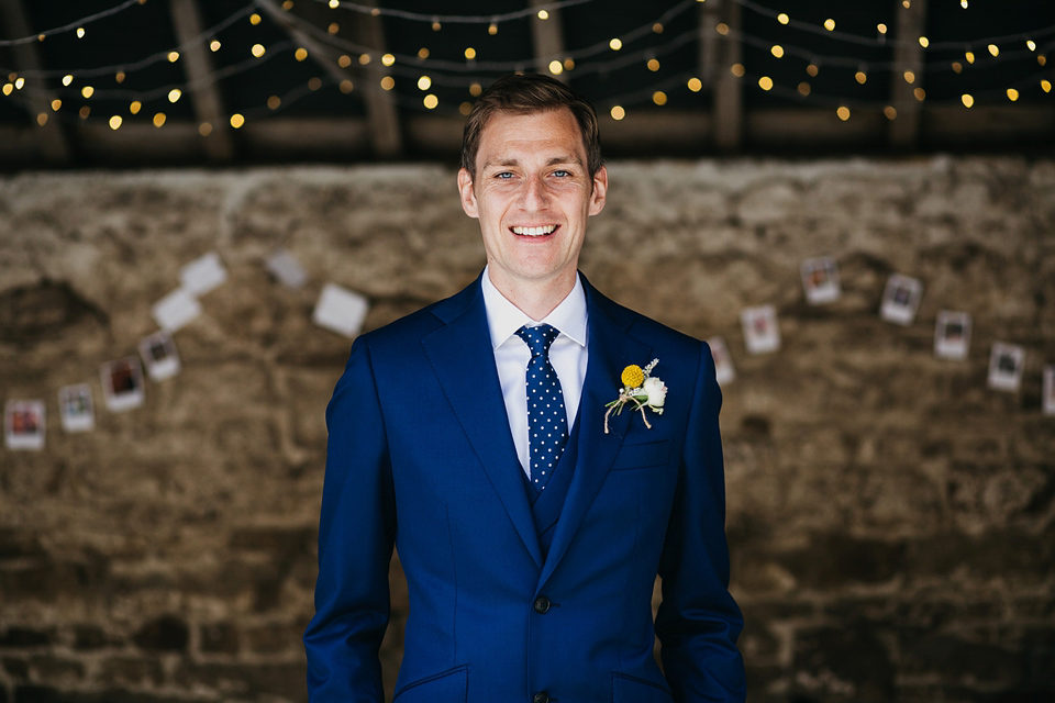 A Suzanne Neville gown and shades fo pink for a colourful wedding at Healey Barn, Northumberland. Photography by John Hope.