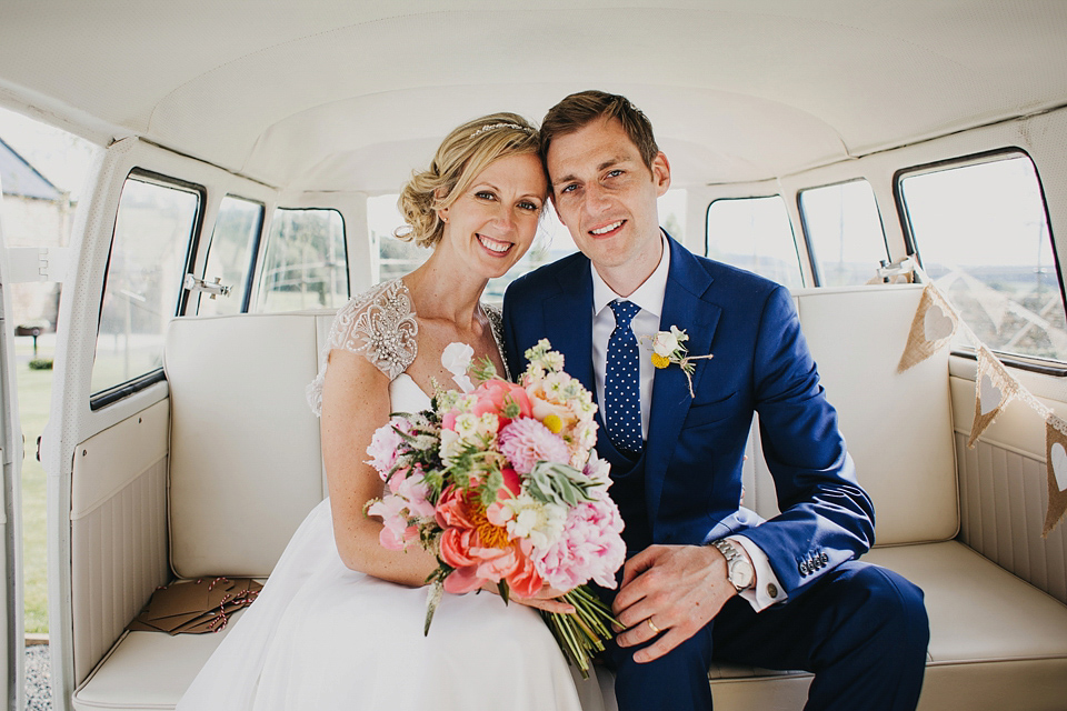 A Suzanne Neville gown and shades fo pink for a colourful wedding at Healey Barn, Northumberland. Photography by John Hope.