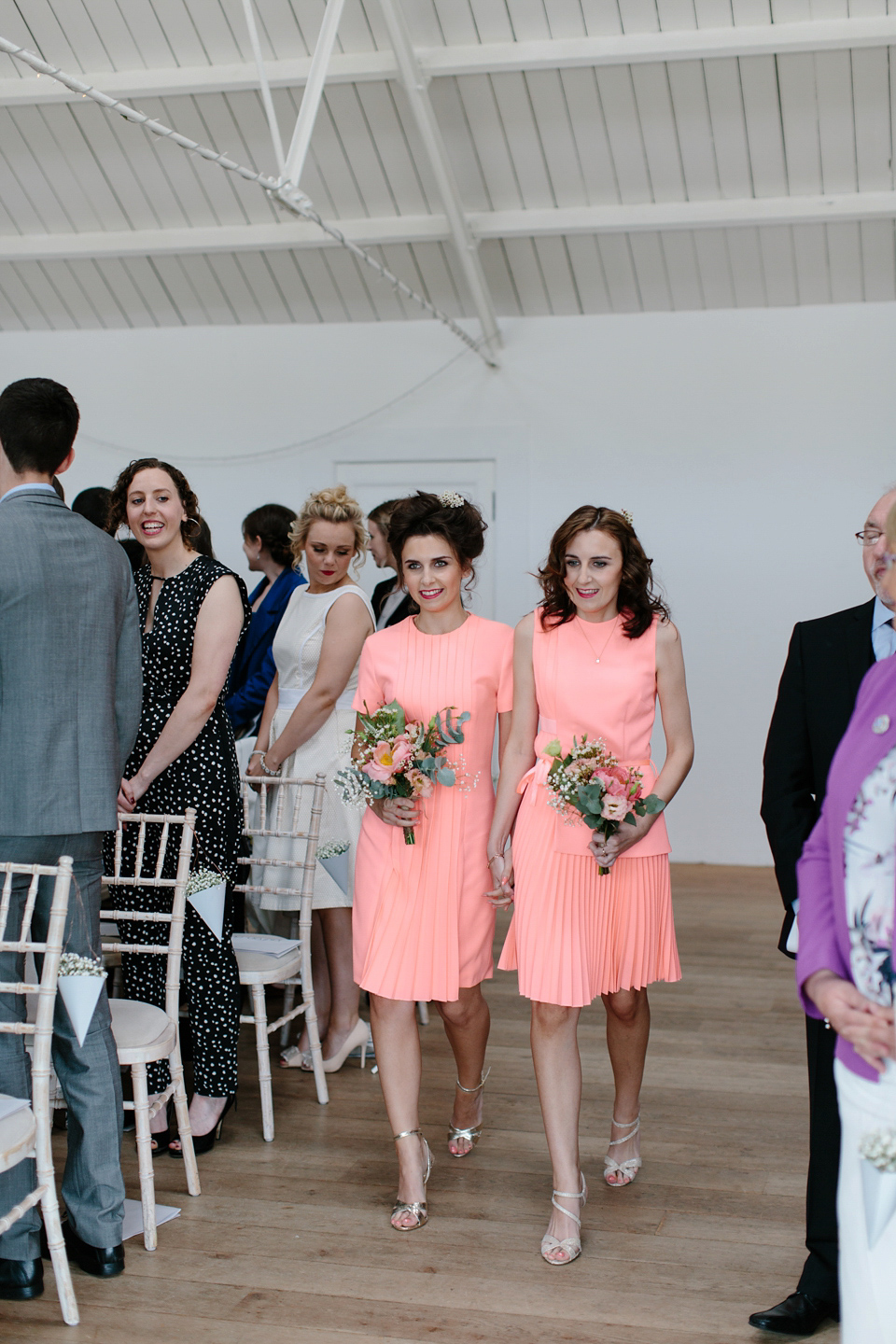 Lauren wears an original vintage 1940s wedding dress and veil for her elegant and colourful wedding at Crear in Scotland. Photography by Caro Weiss.