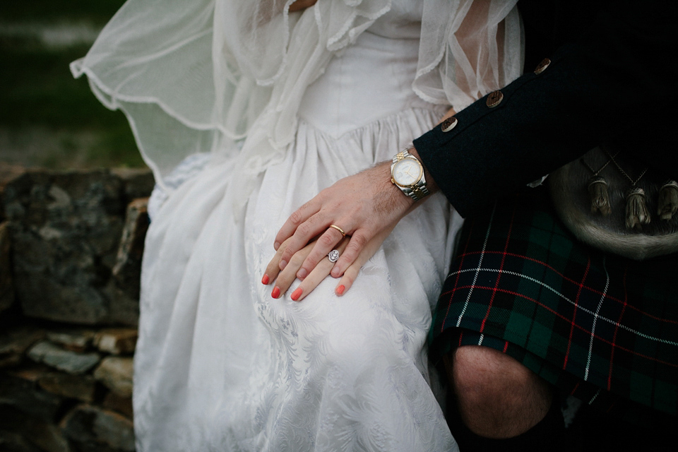 Lauren wears an original vintage 1940s wedding dress and veil for her elegant and colourful wedding at Crear in Scotland. Photography by Caro Weiss.