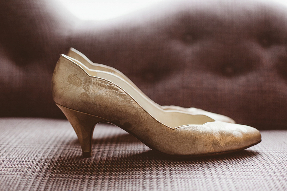 Bride Jennifer wears a gold Lela Rose wedding dress for her Roman Baths wedding. Her maids wear Rachel Gilbert. Images by A Thing Like That Photography.