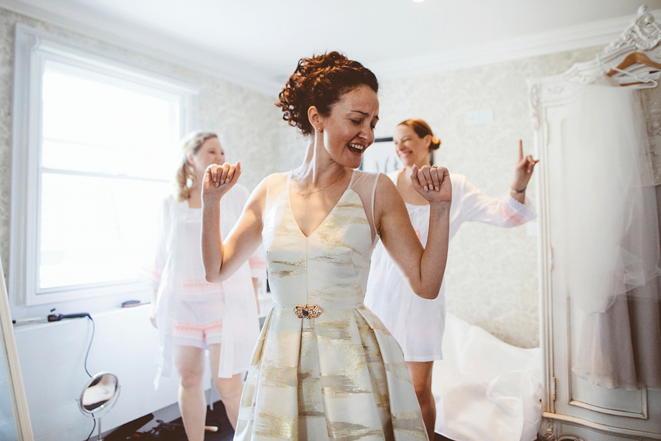 Bride Jennifer wears a gold Lela Rose wedding dress for her Roman Baths wedding. Her maids wear Rachel Gilbert. Images by A Thing Like That Photography.