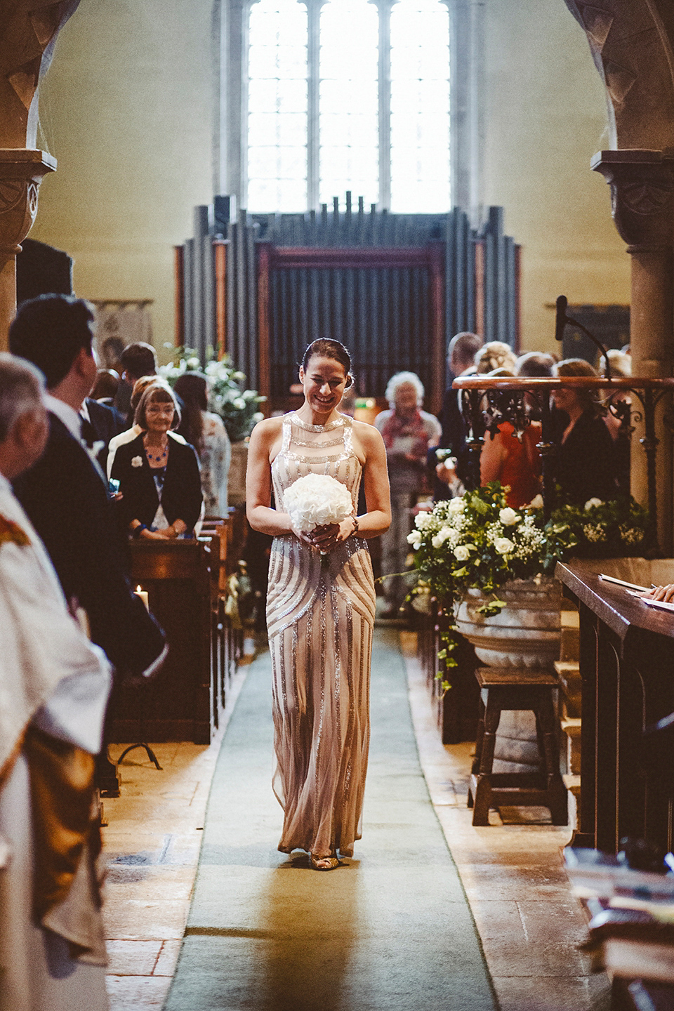 Bride Jennifer wears a gold Lela Rose wedding dress for her Roman Baths wedding. Her maids wear Rachel Gilbert. Images by A Thing Like That Photography.