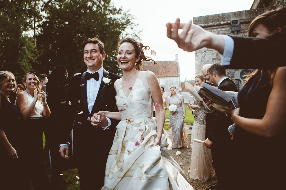 Bride Jennifer wears a gold Lela Rose wedding dress for her Roman Baths wedding. Her maids wear Rachel Gilbert. Images by A Thing Like That Photography.