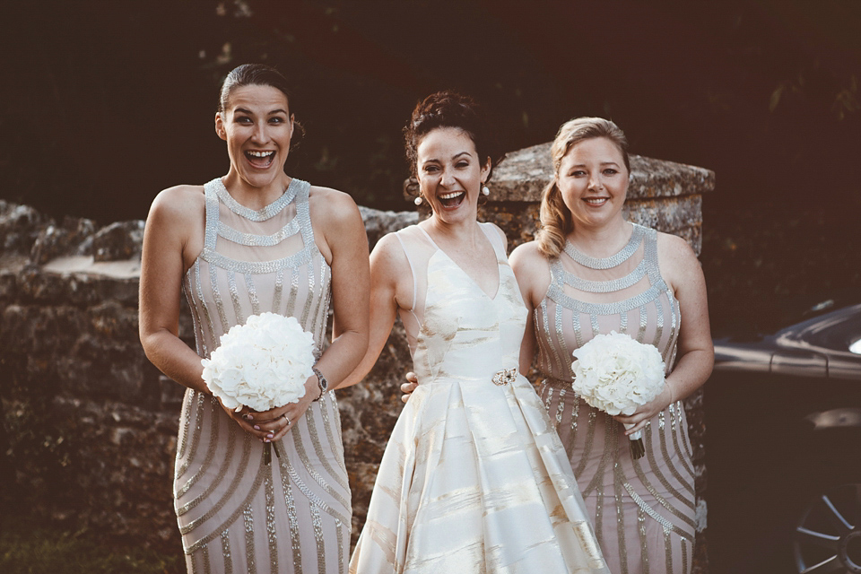 Bride Jennifer wears a gold Lela Rose wedding dress for her Roman Baths wedding. Her maids wear Rachel Gilbert. Images by A Thing Like That Photography.