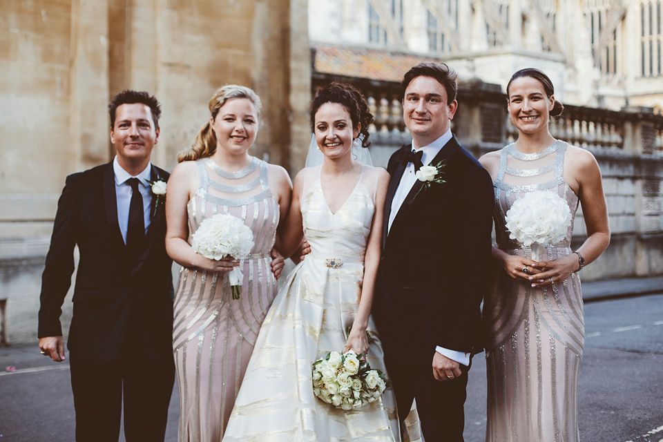 Bride Jennifer wears a gold Lela Rose wedding dress for her Roman Baths wedding. Her maids wear Rachel Gilbert. Images by A Thing Like That Photography.