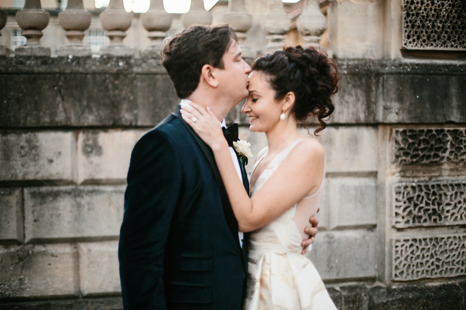 Bride Jennifer wears a gold Lela Rose wedding dress for her Roman Baths wedding. Her maids wear Rachel Gilbert. Images by A Thing Like That Photography.