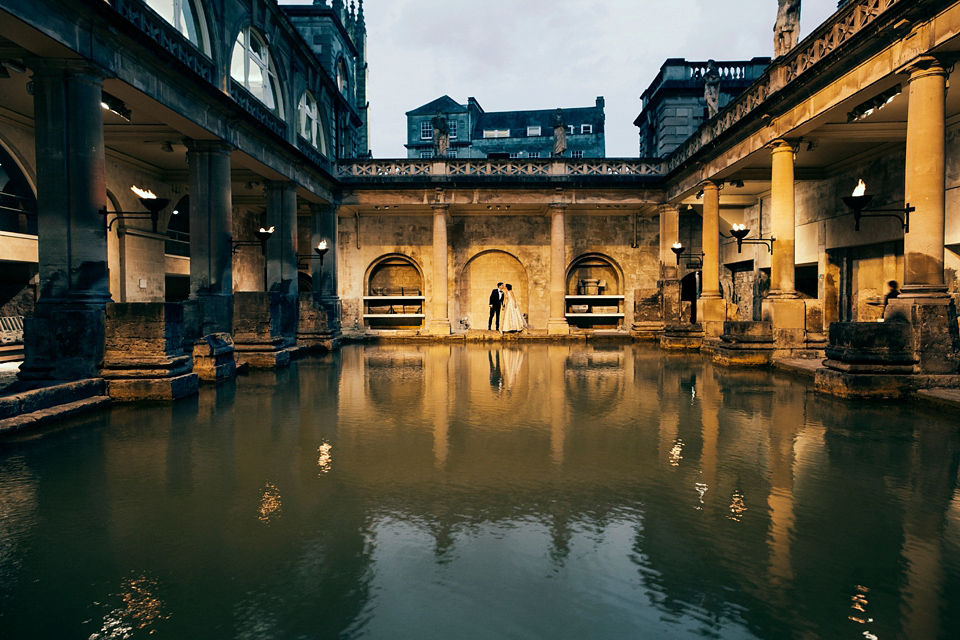 Bride Jennifer wears a gold Lela Rose wedding dress for her Roman Baths wedding. Her maids wear Rachel Gilbert. Images by A Thing Like That Photography.