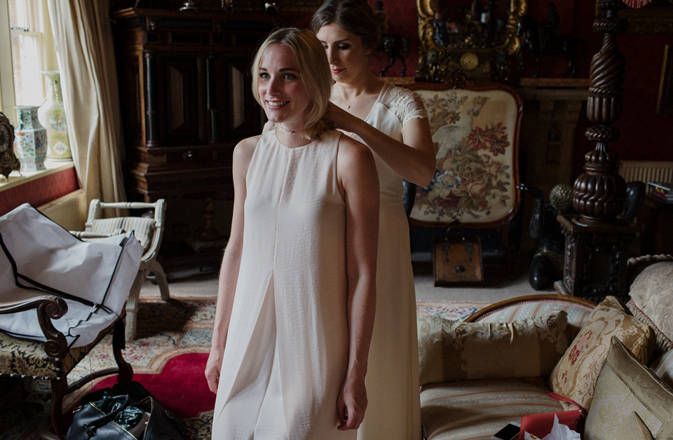 Bride Alex wore a Hermione de Paula gown for her modern, quirky wedding at Maunsel House in Somerset. Photography by Karolina of Hearts on Fire.