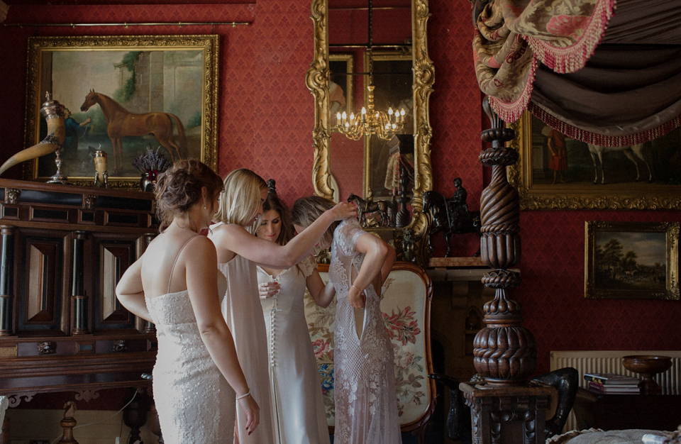 Bride Alex wore a Hermione de Paula gown for her modern, quirky wedding at Maunsel House in Somerset. Photography by Karolina of Hearts on Fire.