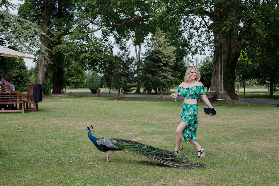 Bride Alex wore a Hermione de Paula gown for her modern, quirky wedding at Maunsel House in Somerset. Photography by Karolina of Hearts on Fire.