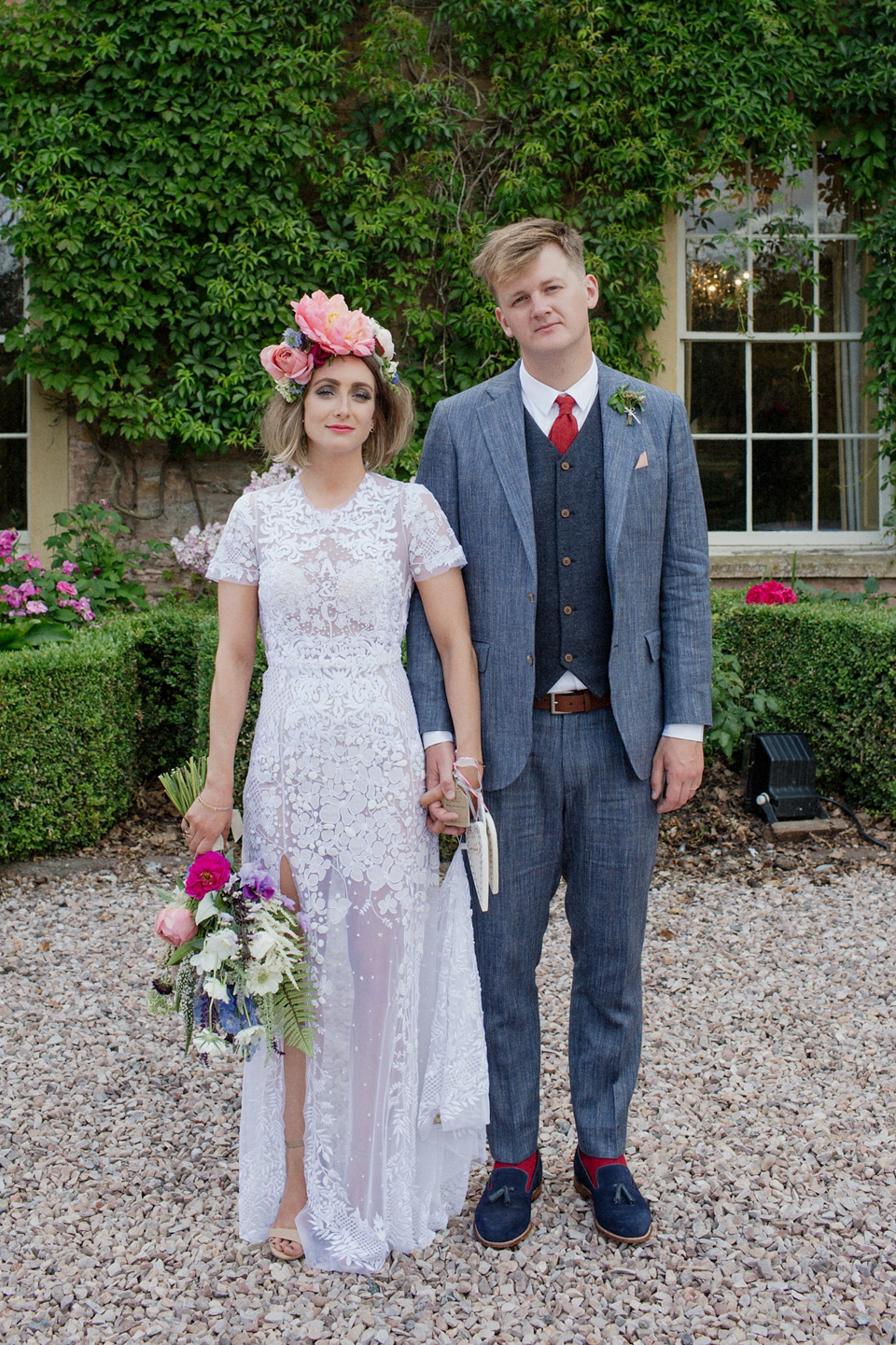 Bride Alex wore a Hermione de Paula gown for her modern, quirky wedding at Maunsel House in Somerset. Photography by Karolina of Hearts on Fire.