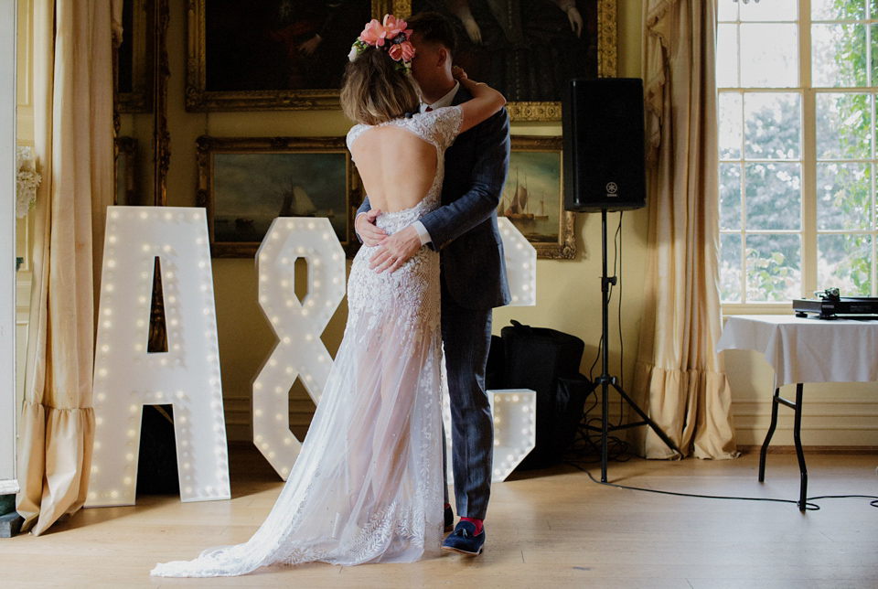 Bride Alex wore a Hermione de Paula gown for her modern, quirky wedding at Maunsel House in Somerset. Photography by Karolina of Hearts on Fire.