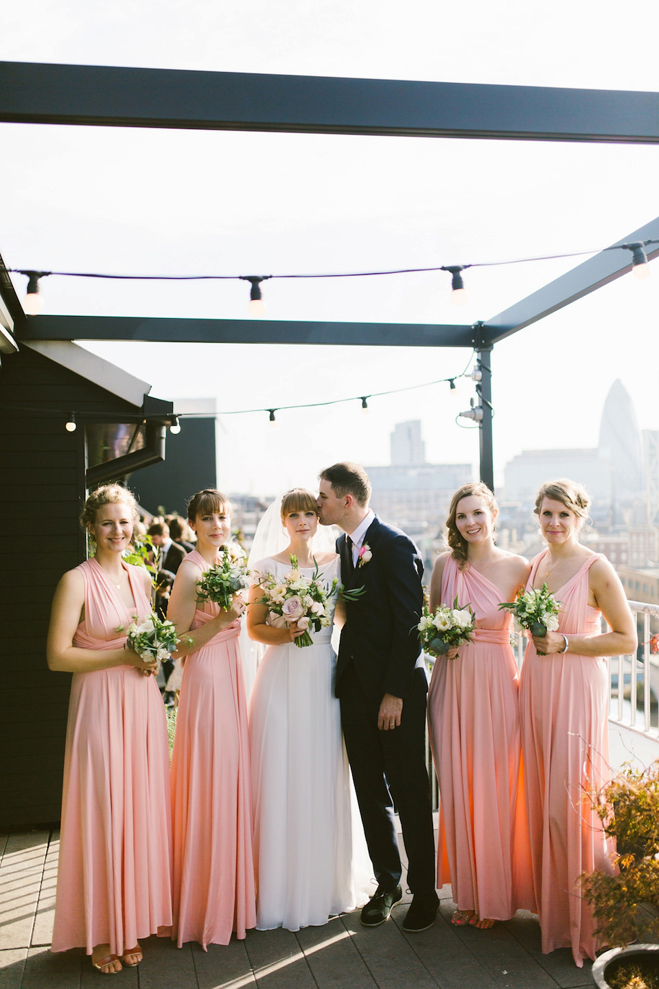 Bride Carly wears a Belle & Bunty gown for her cool East London wedding at the ACE hotel, Shoreditch. Photography by Alain M.