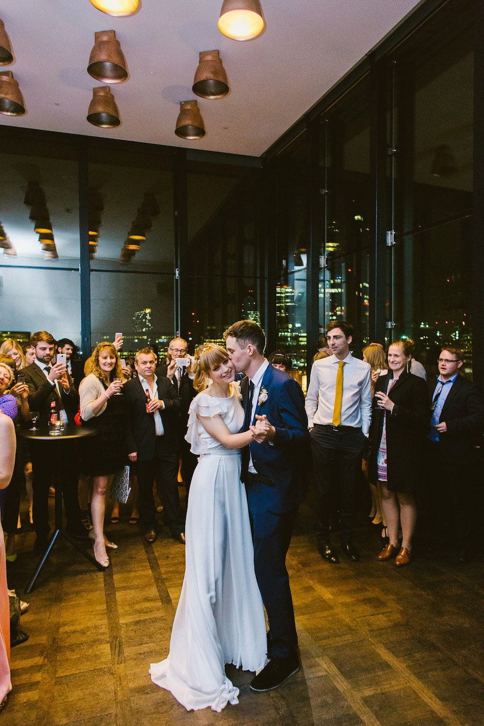 Bride Carly wears a Belle & Bunty gown for her cool East London wedding at the ACE hotel, Shoreditch. Photography by Alain M.