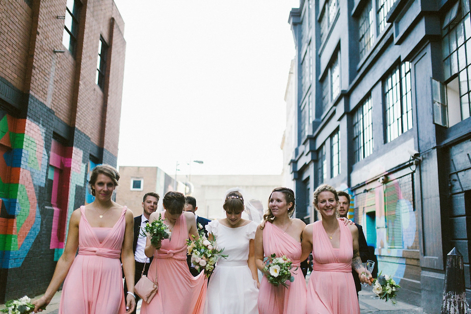 Bride Carly wears a Belle & Bunty gown for her cool East London wedding at the ACE hotel, Shoreditch. Photography by Alain M.