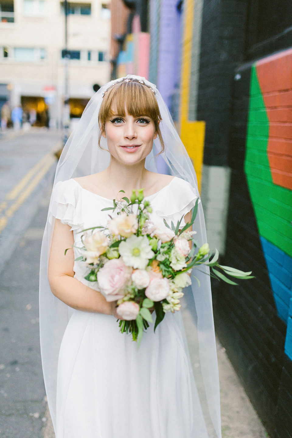 Bride Carly wears a Belle & Bunty gown for her cool East London wedding at the ACE hotel, Shoreditch. Photography by Alain M.