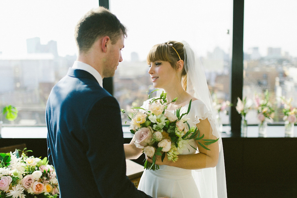 Bride Carly wears a Belle & Bunty gown for her cool East London wedding at the ACE hotel, Shoreditch. Photography by Alain M.