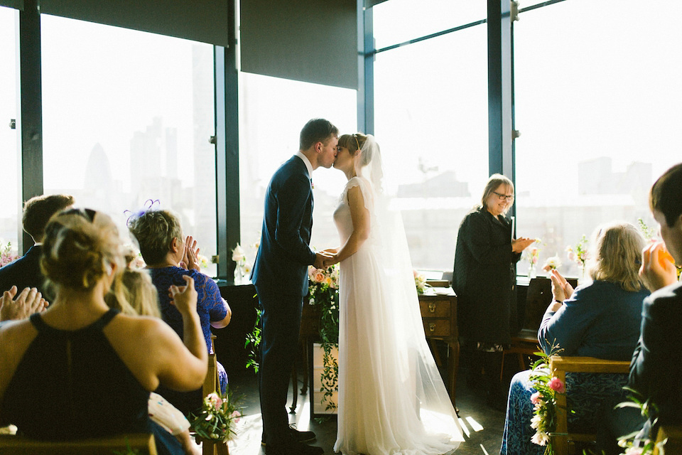 Bride Carly wears a Belle & Bunty gown for her cool East London wedding at the ACE hotel, Shoreditch. Photography by Alain M.