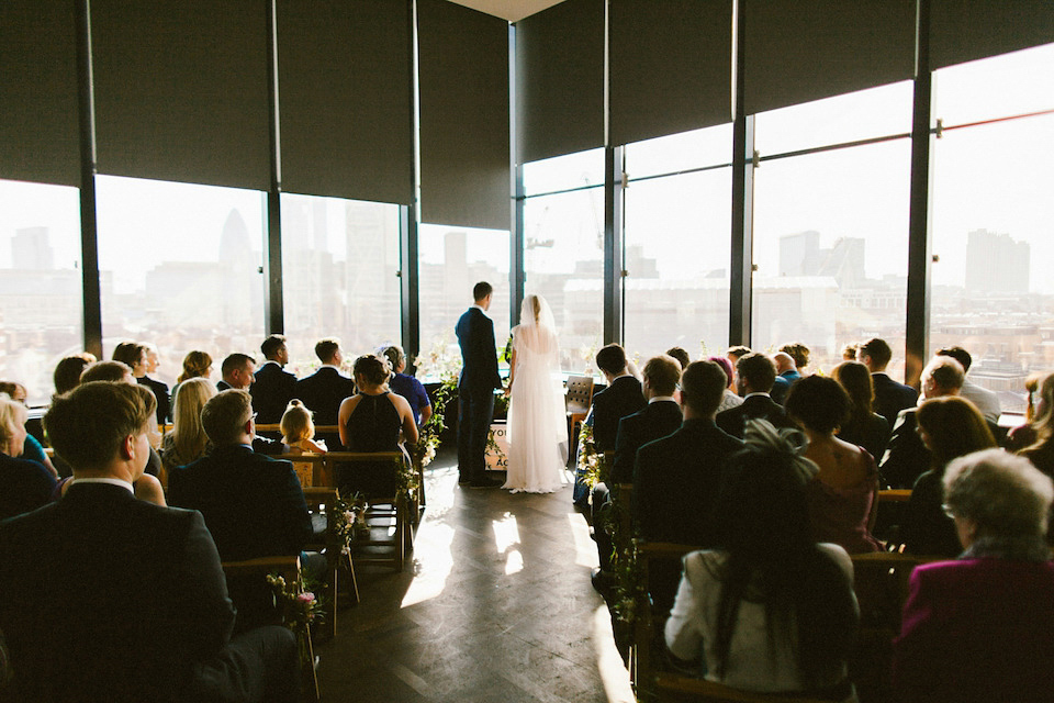 Bride Carly wears a Belle & Bunty gown for her cool East London wedding at the ACE hotel, Shoreditch. Photography by Alain M.