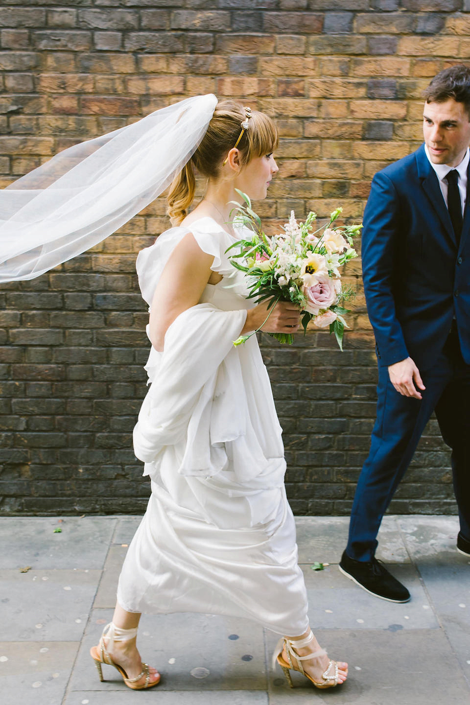 Bride Carly wears a Belle & Bunty gown for her cool East London wedding at the ACE hotel, Shoreditch. Photography by Alain M.