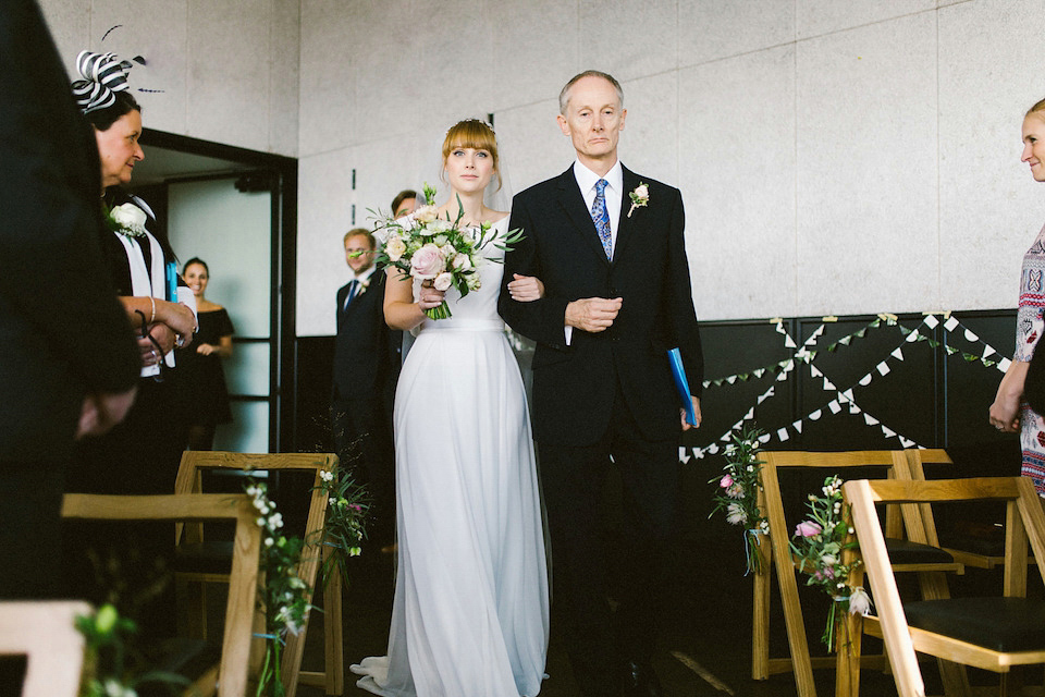 Bride Carly wears a Belle & Bunty gown for her cool East London wedding at the ACE hotel, Shoreditch. Photography by Alain M.