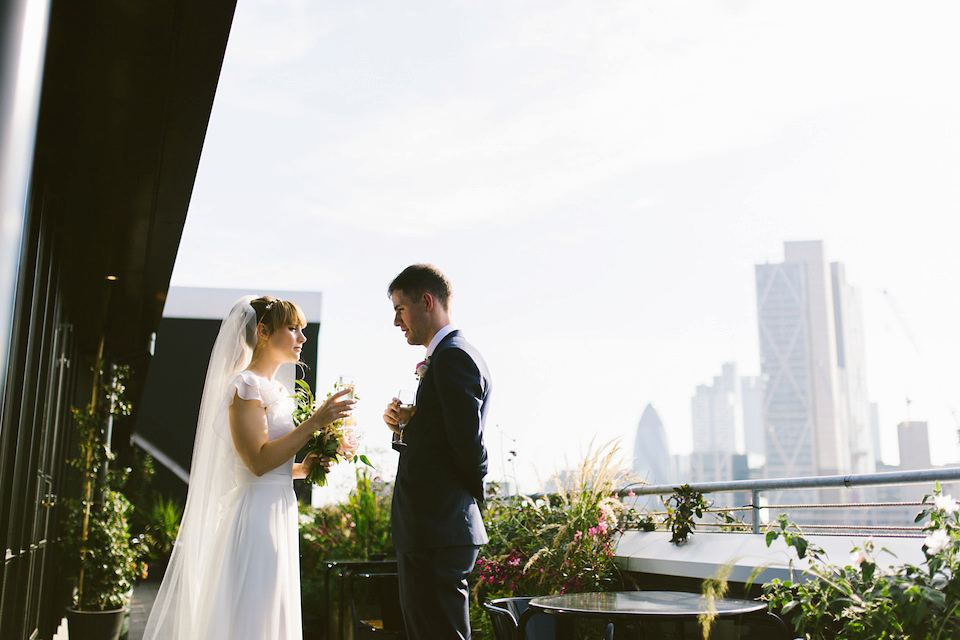 Bride Carly wears a Belle & Bunty gown for her cool East London wedding at the ACE hotel, Shoreditch. Photography by Alain M.