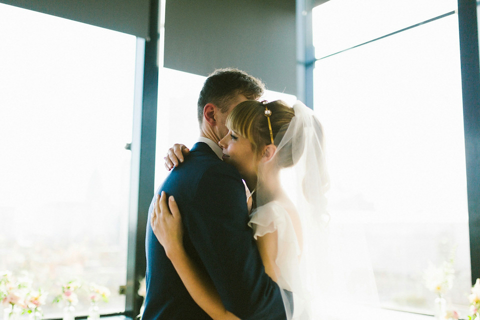 Bride Carly wears a Belle & Bunty gown for her cool East London wedding at the ACE hotel, Shoreditch. Photography by Alain M.