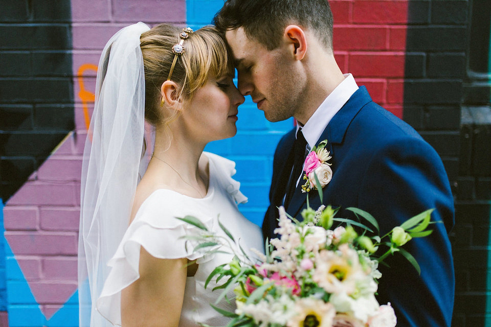 Bride Carly wears a Belle & Bunty gown for her cool East London wedding at the ACE hotel, Shoreditch. Photography by Alain M.