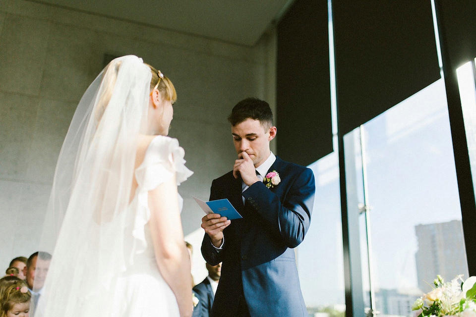 Bride Carly wears a Belle & Bunty gown for her cool East London wedding at the ACE hotel, Shoreditch. Photography by Alain M.