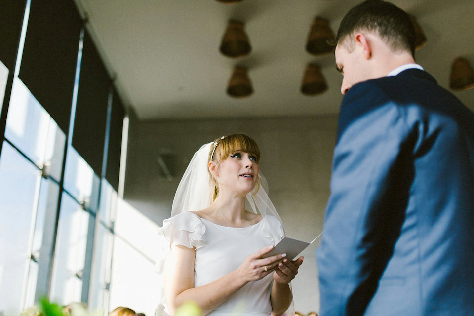 Bride Carly wears a Belle & Bunty gown for her cool East London wedding at the ACE hotel, Shoreditch. Photography by Alain M.