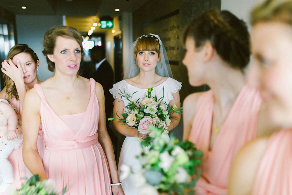 Bride Carly wears a Belle & Bunty gown for her cool East London wedding at the ACE hotel, Shoreditch. Photography by Alain M.