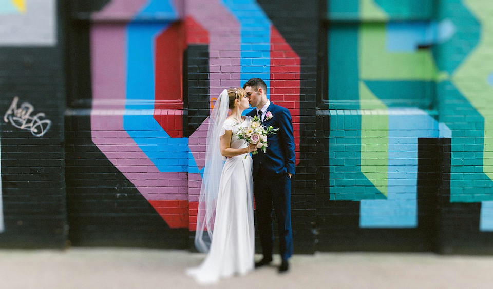 Bride Carly wears a Belle & Bunty gown for her cool East London wedding at the ACE hotel, Shoreditch. Photography by Alain M.