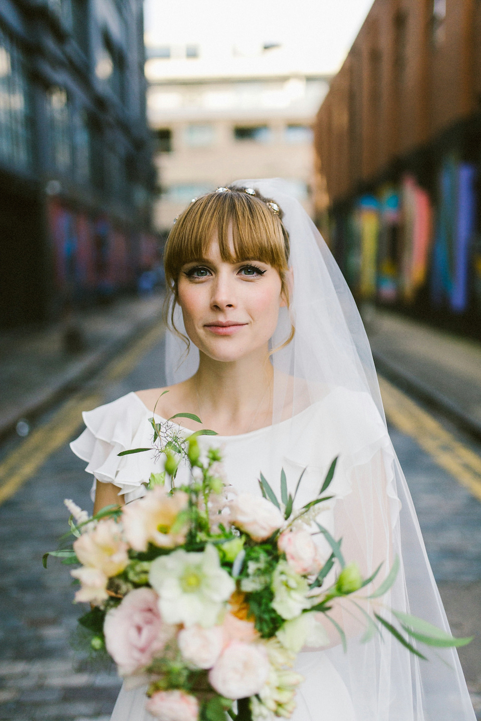 Bride Carly wears a Belle & Bunty gown for her cool East London wedding at the ACE hotel, Shoreditch. Photography by Alain M.